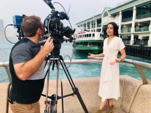 Paul Devitt filming at Hong Kong Harbour